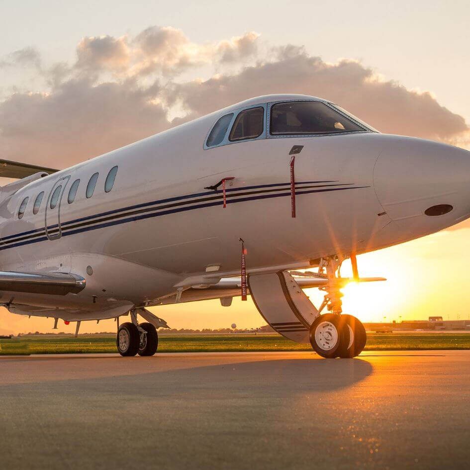 Aeroplane in the sunset on a runway