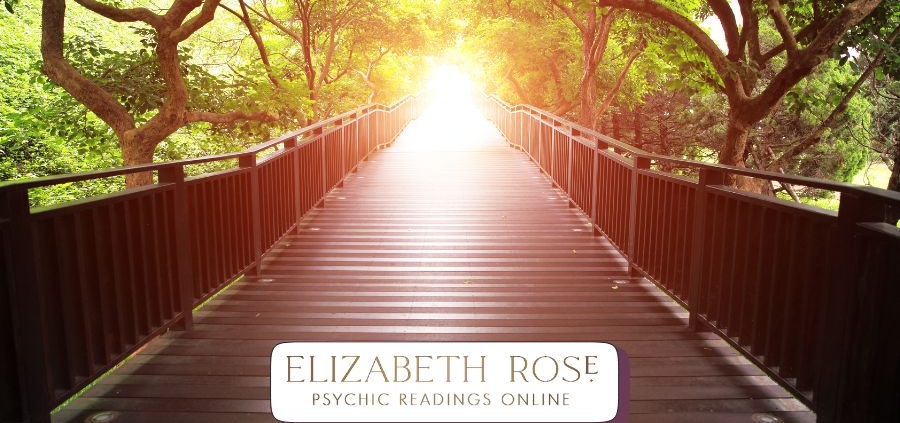 A wooden bridge with a light at the end symbolising life path decisions