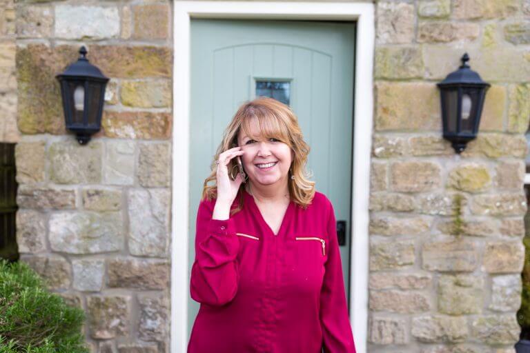 Women On The Telephone Speaking To A Psychic